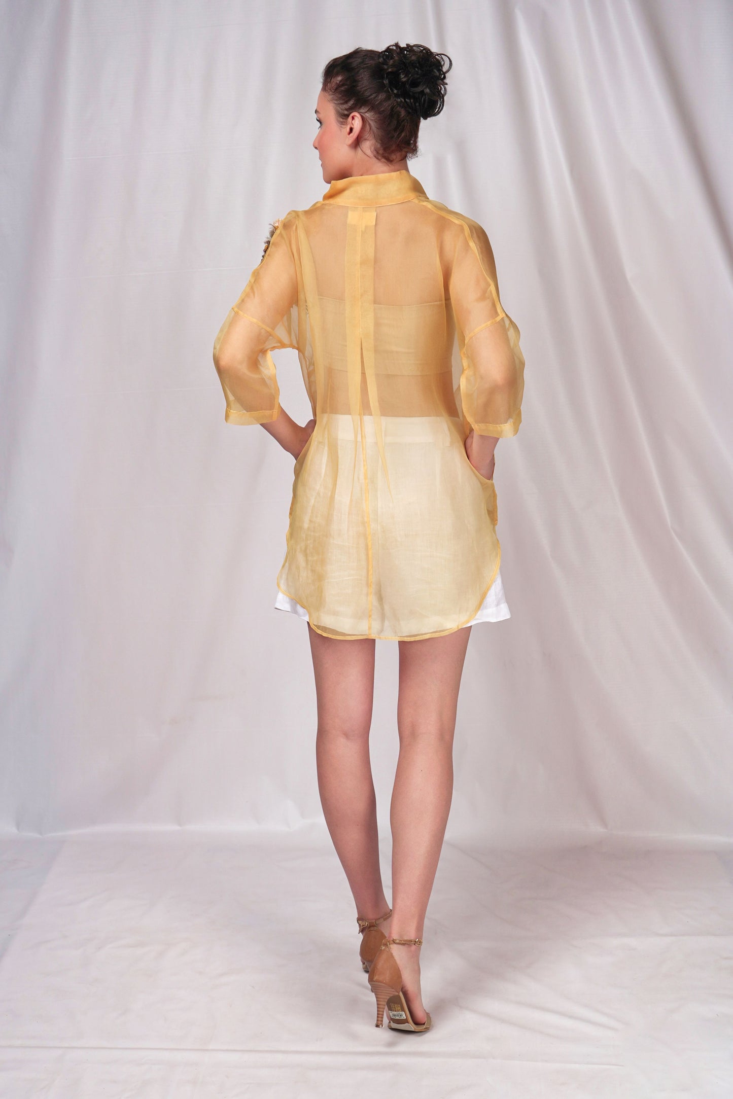 Organza overshirt on sheer fabric with a turned up collar and hand embroidery detailing over the shoulder