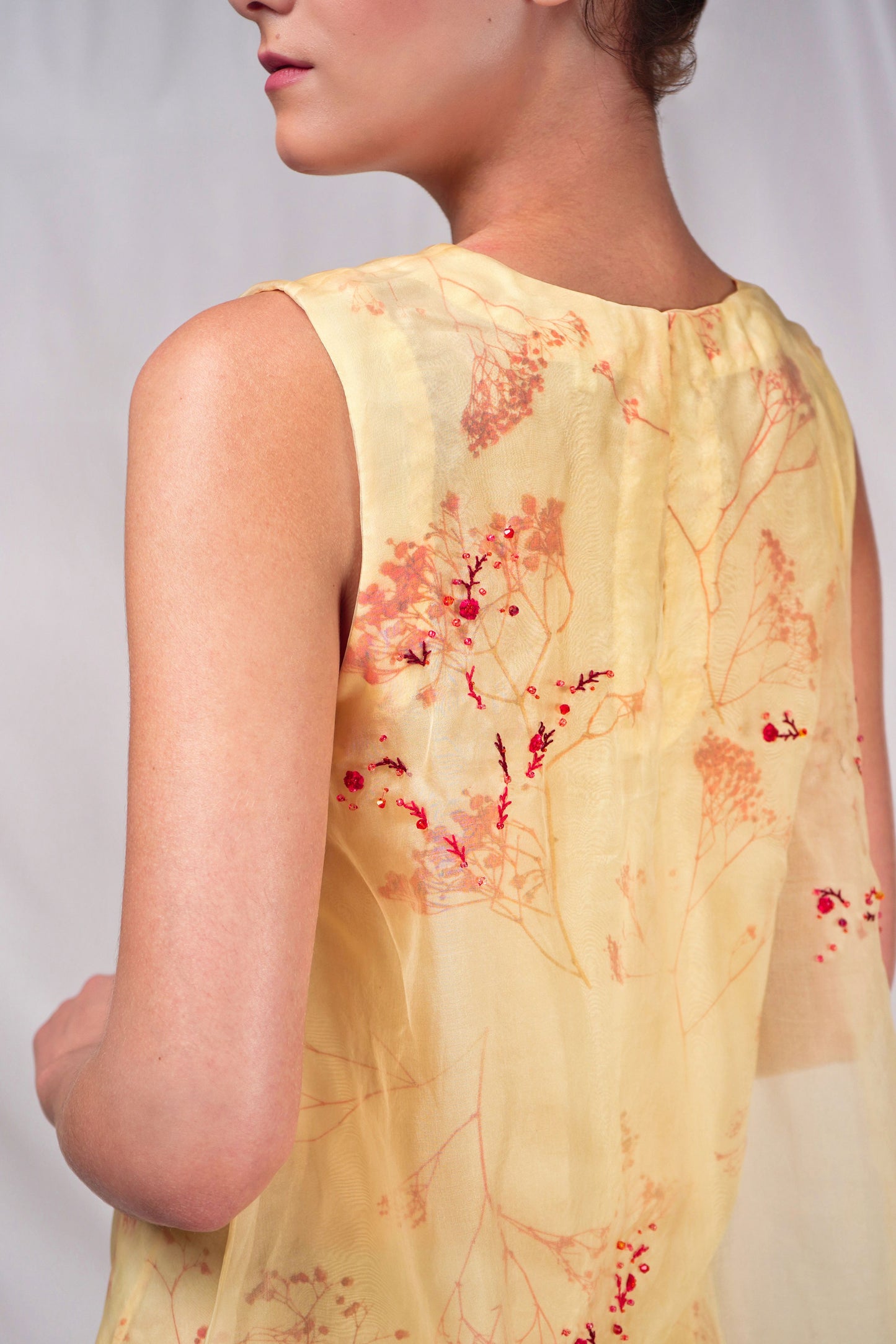 Printed mid thigh length dress with embroidered ankle length organza over layer