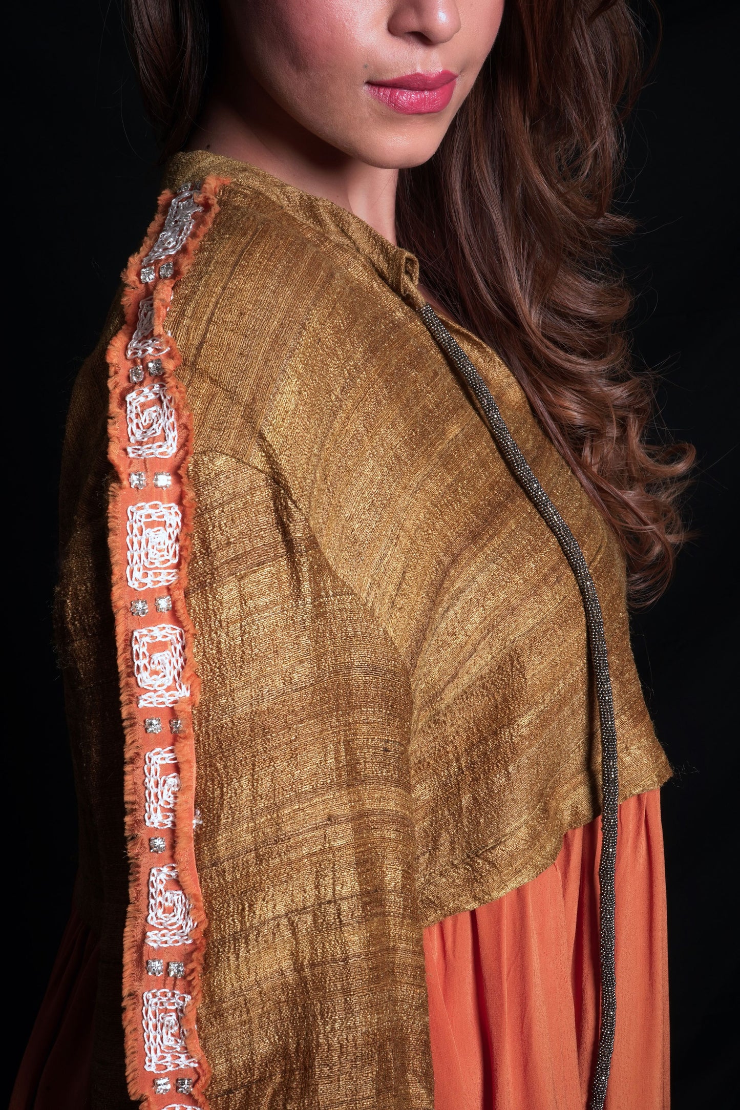 Golden brown and sundial dress with geometric embroidery