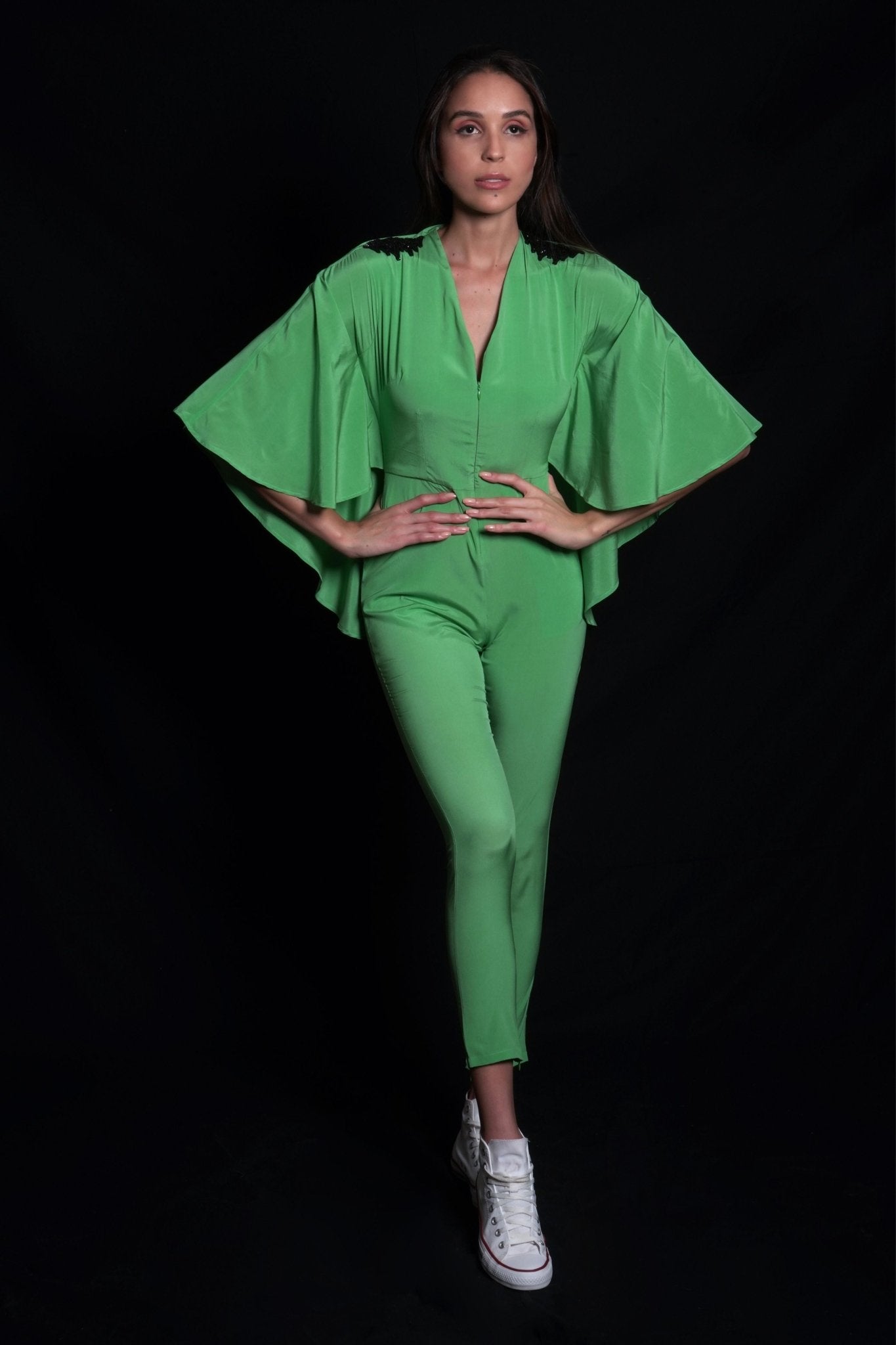 Absinthe green jumpsuit featuring hand-embroidery on shoulders