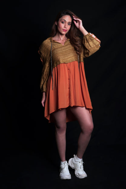 Golden brown and sundial dress with geometric embroidery