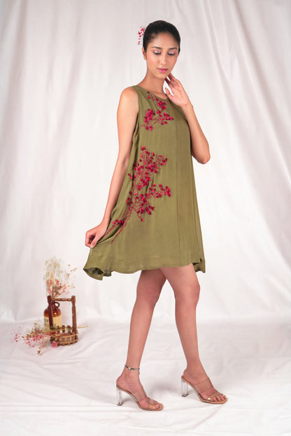 Tent fitted dress with hand-embroidery along one side