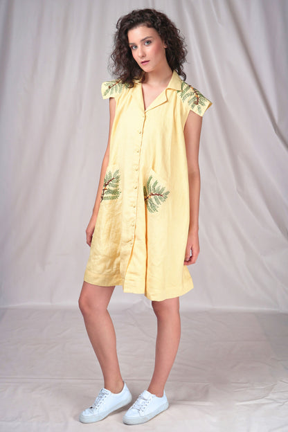 Casual cotton button-down dress with embroidery detailing over the shoulder with patch pockets