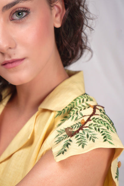 Casual cotton button-down dress with embroidery detailing over the shoulder with patch pockets