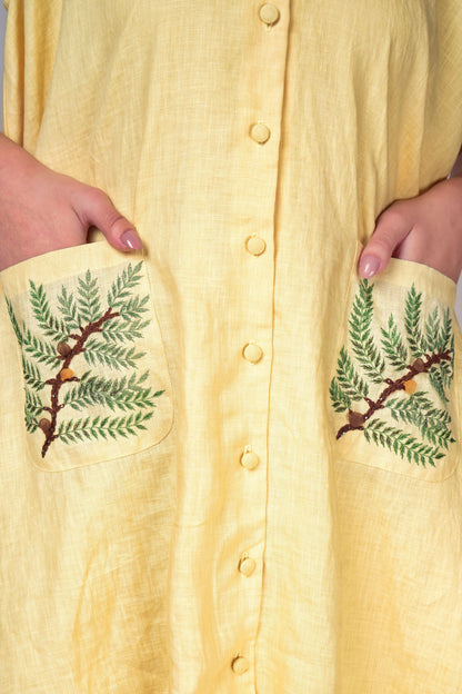 Casual cotton button-down dress with embroidery detailing over the shoulder with patch pockets